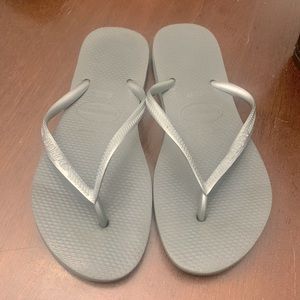 • Havaianas  Grey Flip Flops •
